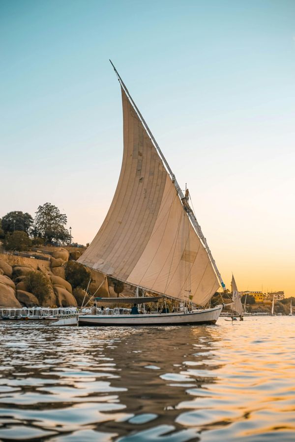 Felucca sailing on the Nile at Aswan at sunset